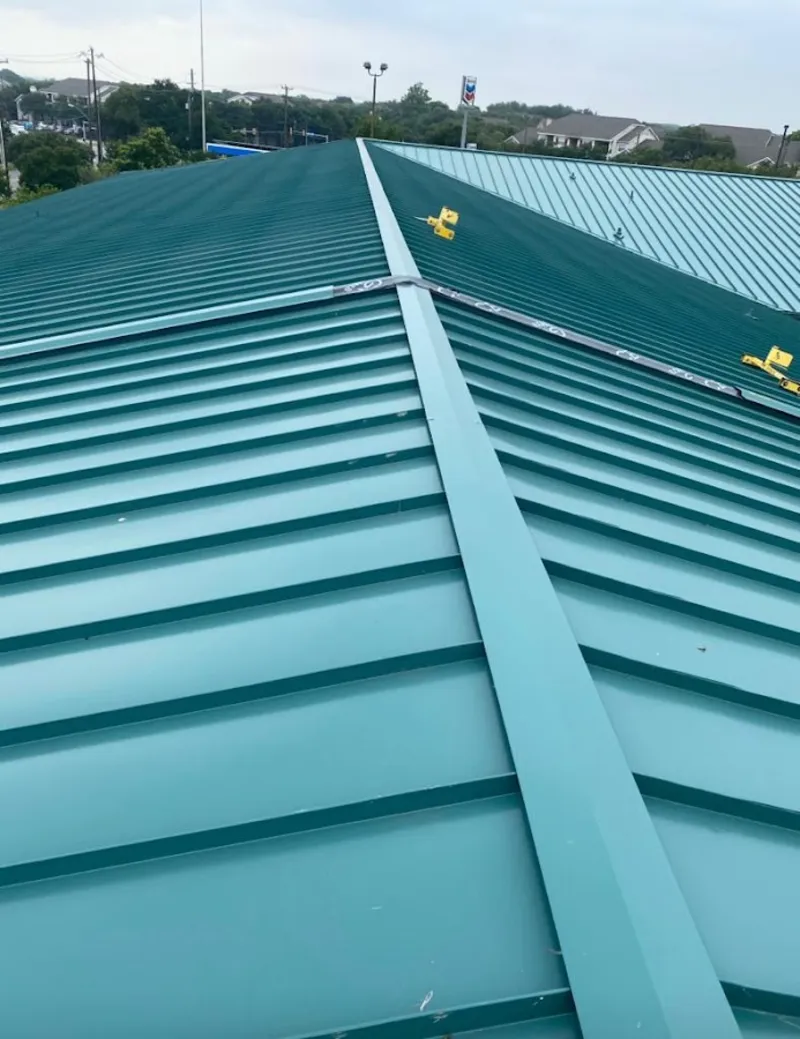 Green commercial metal roof ridge and valley for Metal Roof Repair in Gonzales